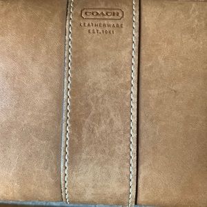 Brown Coach leather snap wallet